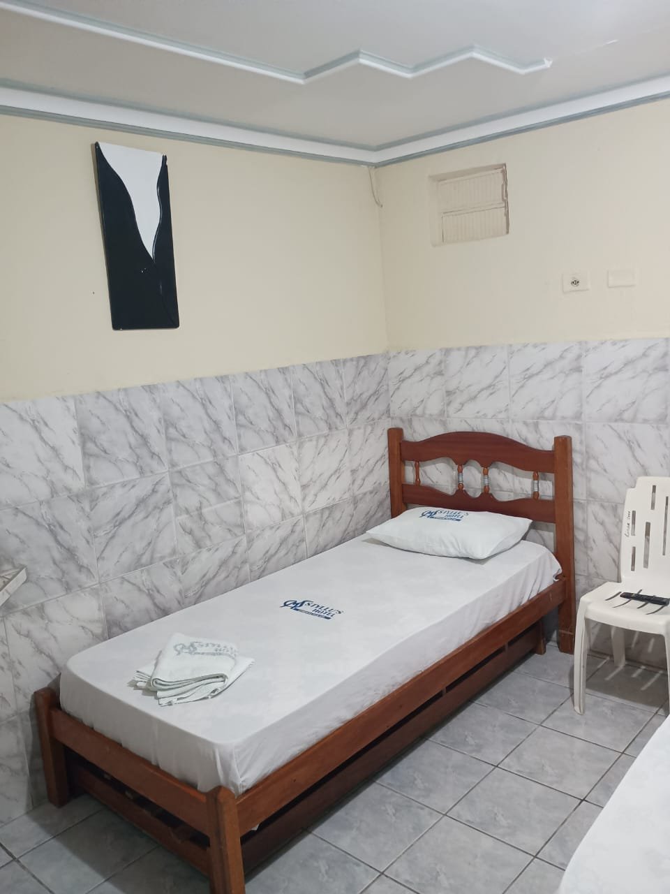 Quarto duplo com cama de casal